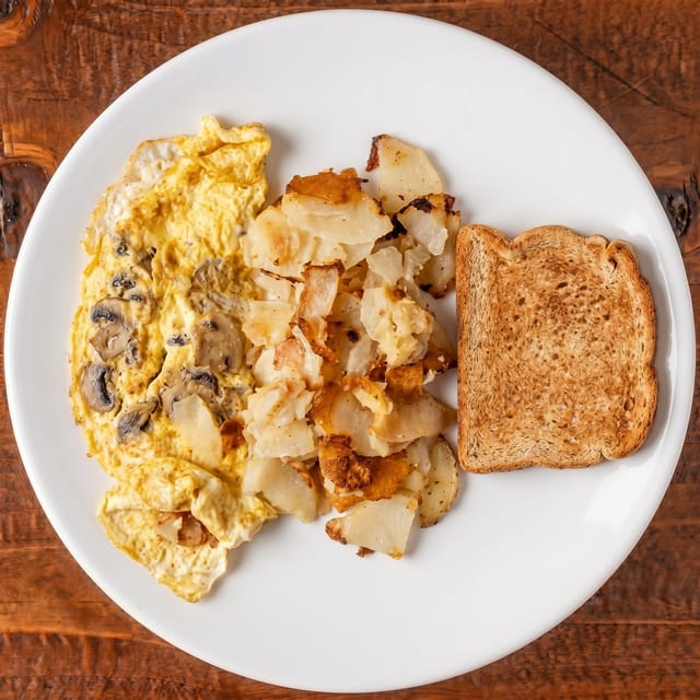 Ham, Bacon, Sausage or Mushroom Omelet.